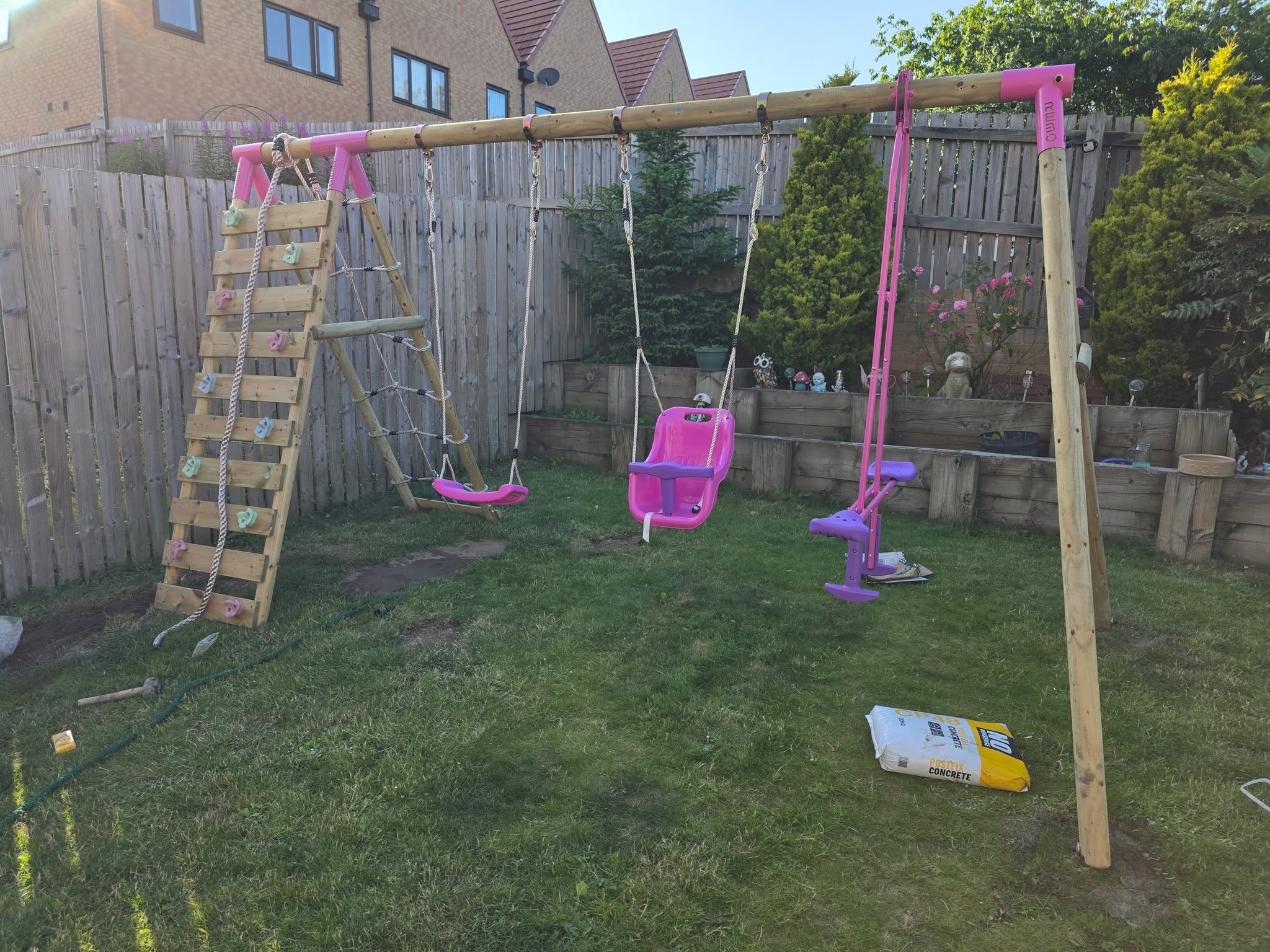 Children's play swing set installed by Mark